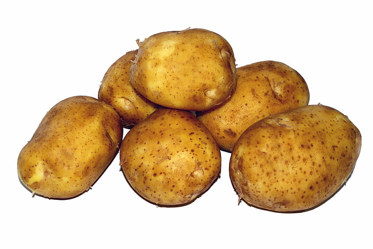 six brown potatoes