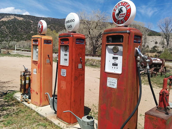 Royalty-Free photo: Three orange gas stations