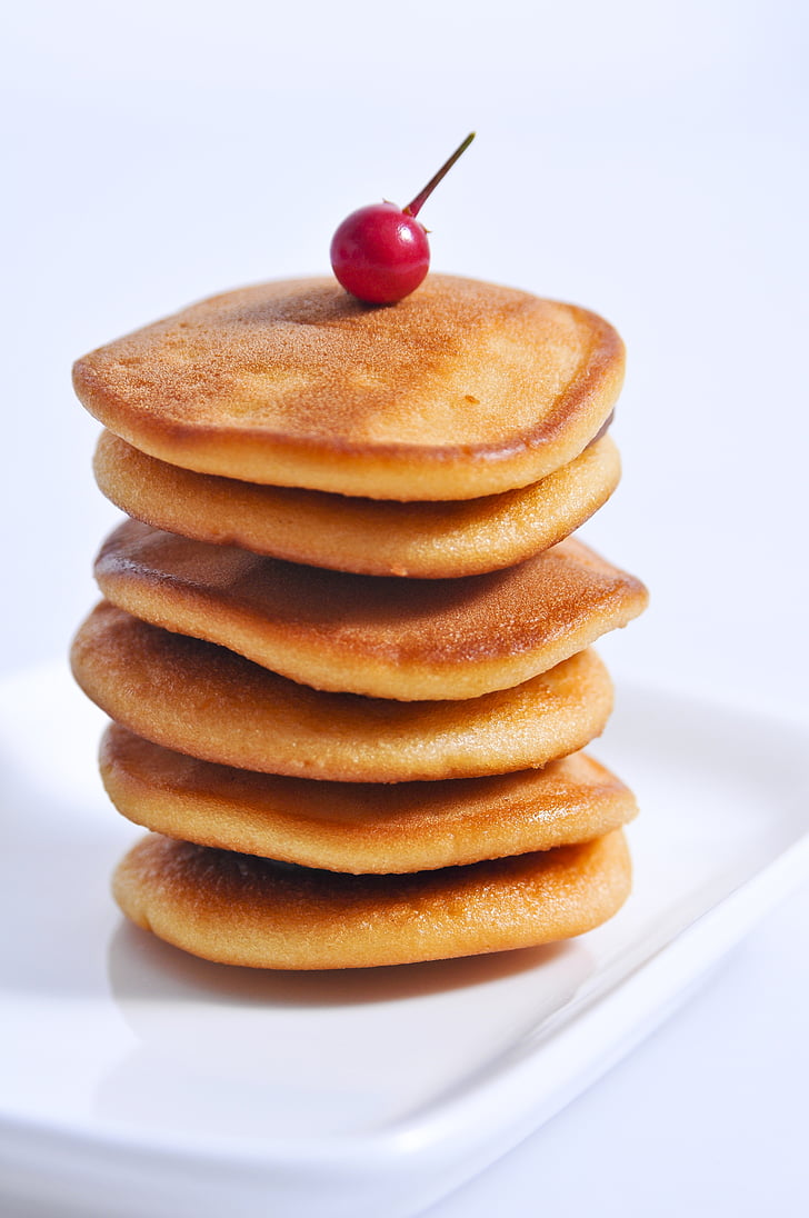 red cherry on pancake