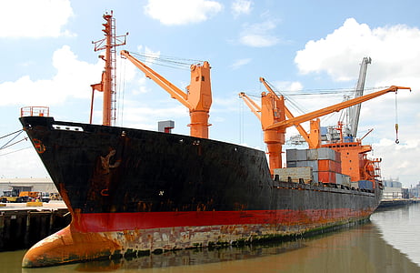 orange and black cargo ship