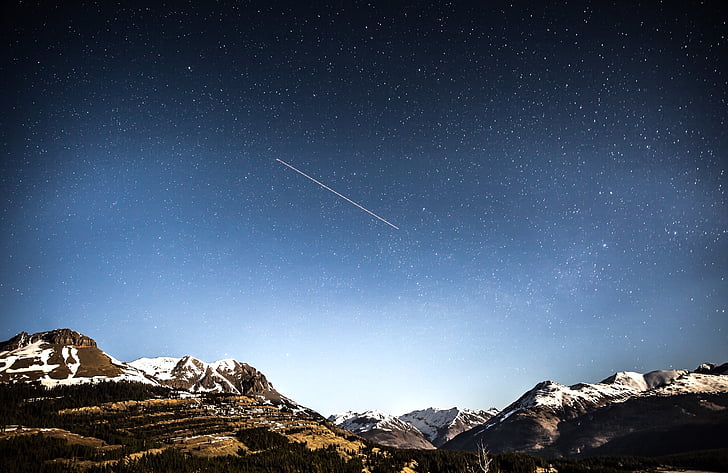 meteor shower over mountain