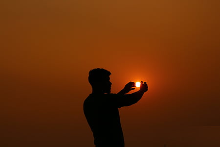 man photo during sunset
