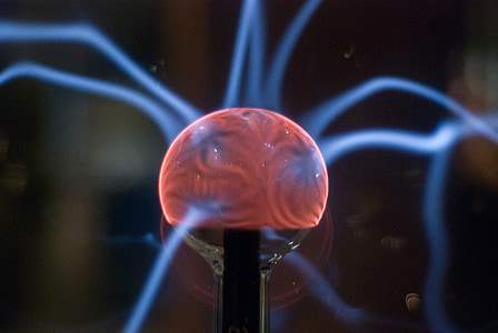 selective focus photography of plasma ball
