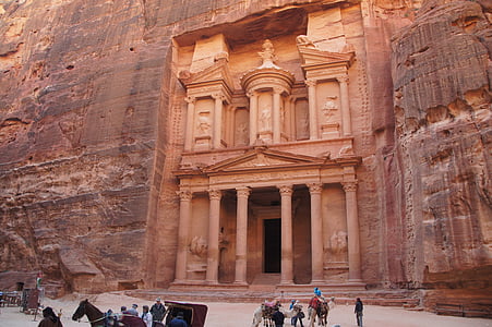 people standing near Petra, Jordan landmark
