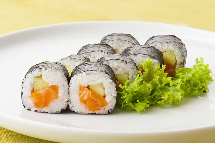 photograph of salmon maki roll