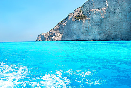 blue sea near white cliffs