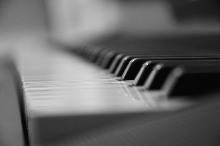 selective focus photo of piano keyboard