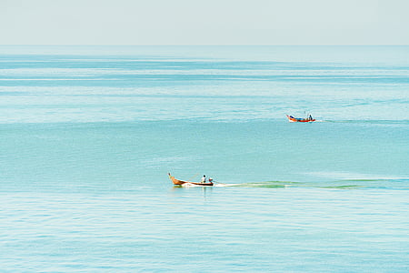 boats in body of water during daytime