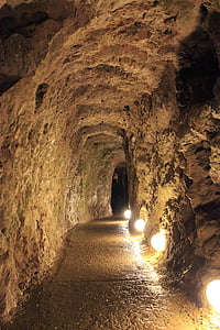 brown underground tunnel