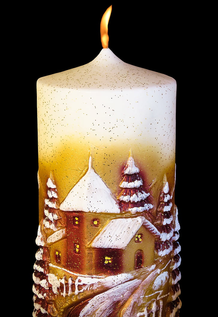 brown and white pillar candle