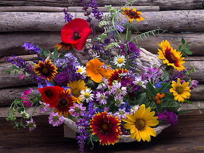 assorted flowers in vase centerpiece