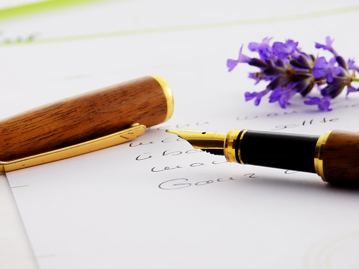 brown and black quill pen