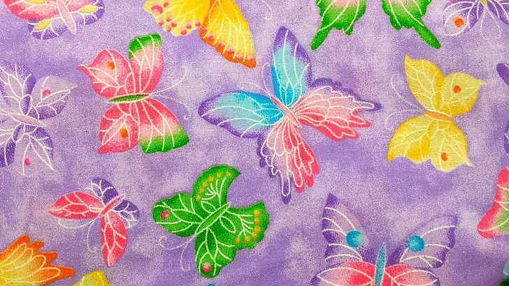 purple and multicolored butterfly printed textile