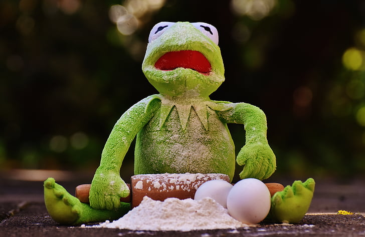 Kermit the Frog holding rolling pin with powder and eggs