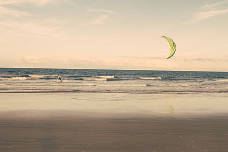 person parasailing during day time