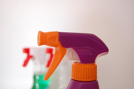purple and orange spray bottle