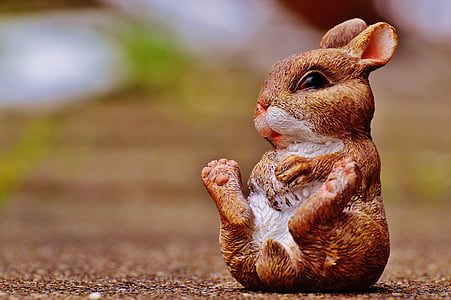 selective focus photograph of brown rabbit plush toy