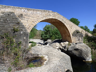 gray brick bridge during dayti,e