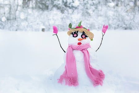 snowman wearing pink scarf