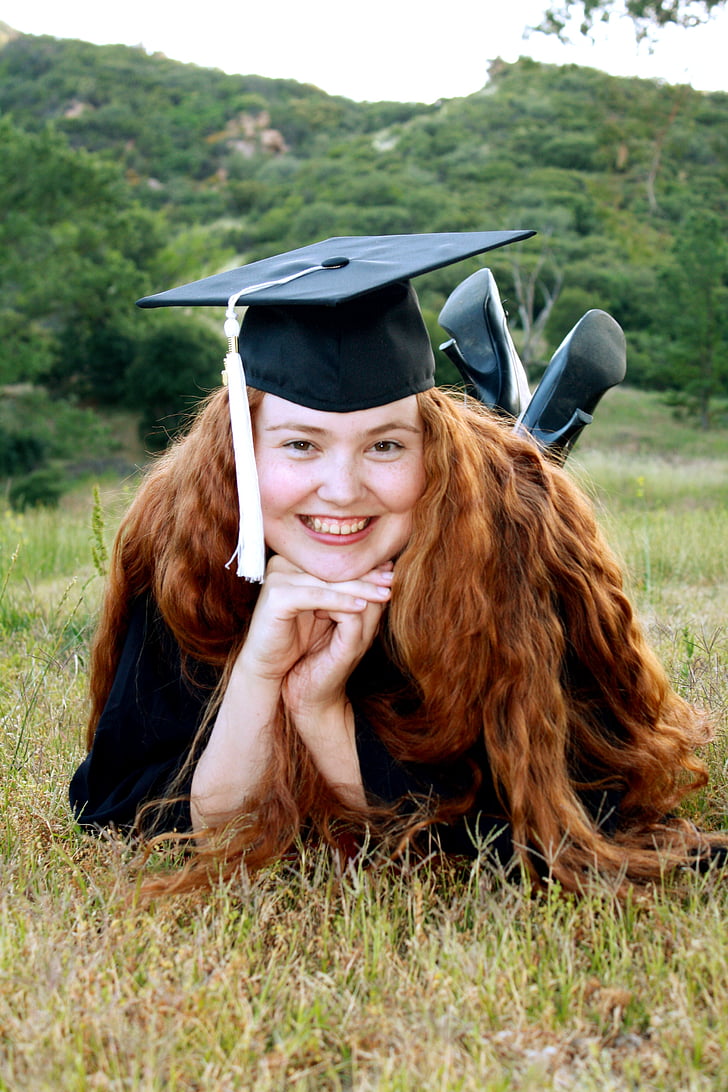 woman wearing black graduation hat