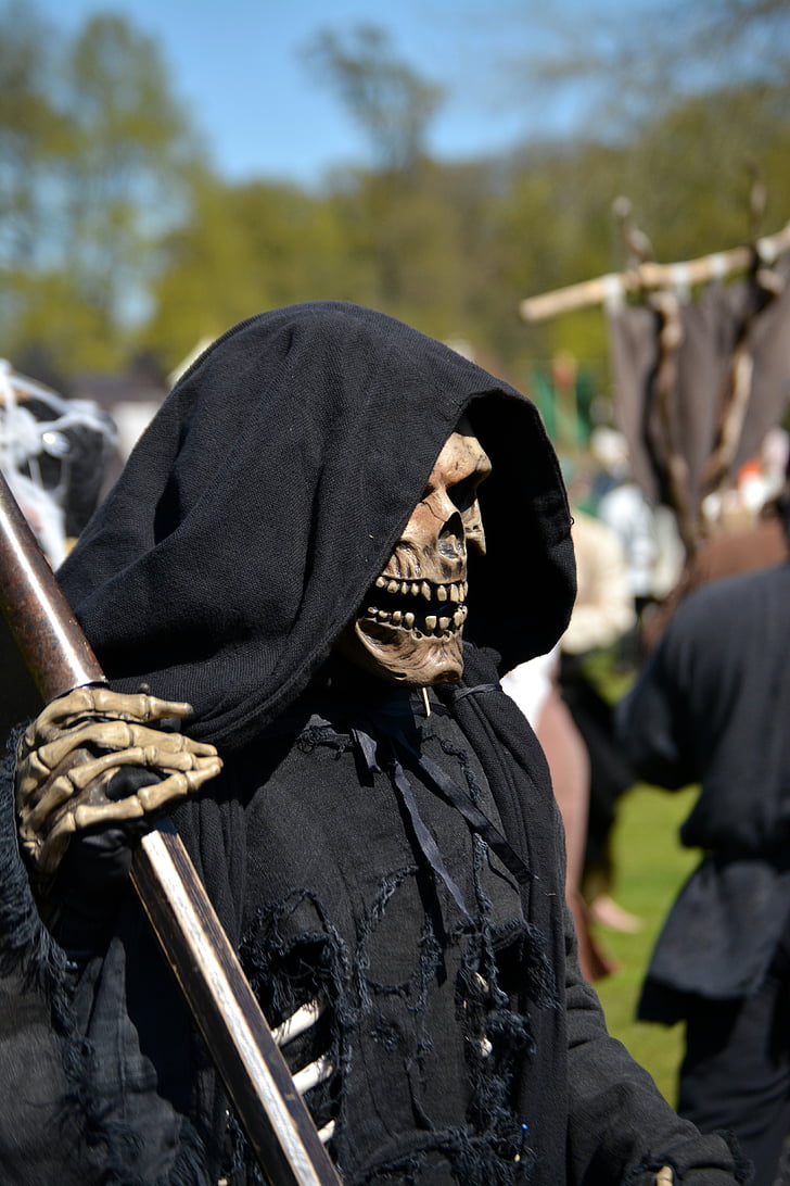 person in grim reaper costume