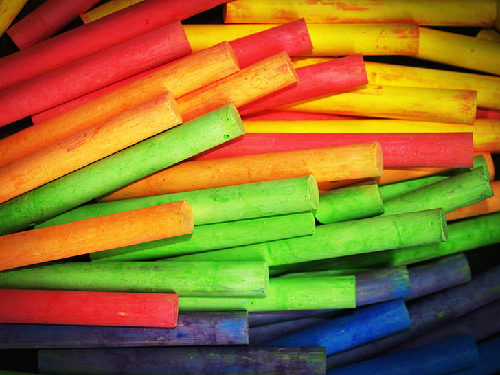 green, red, blue, purple, and yellow wooden sticks