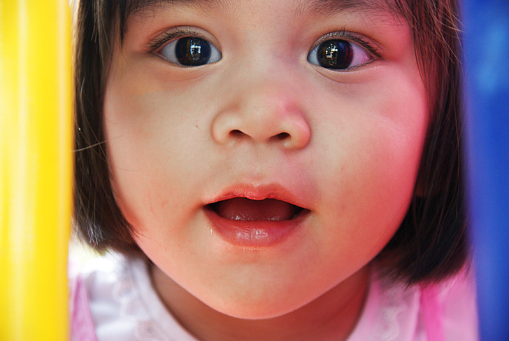 girl's white top in shallow focus photography