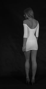 grayscale photography of woman in backless bodycon dress