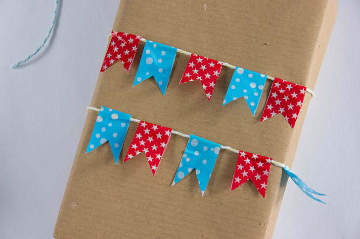 red and blue ribbon strap on box