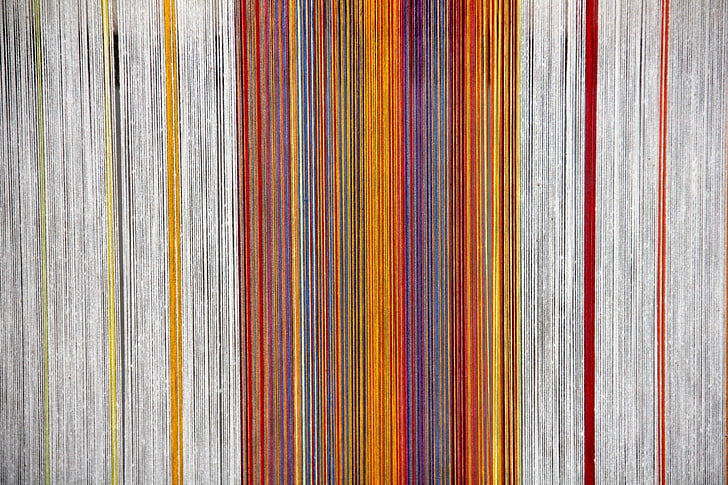 photo of orange and multicolored striped colors digital wallpaper