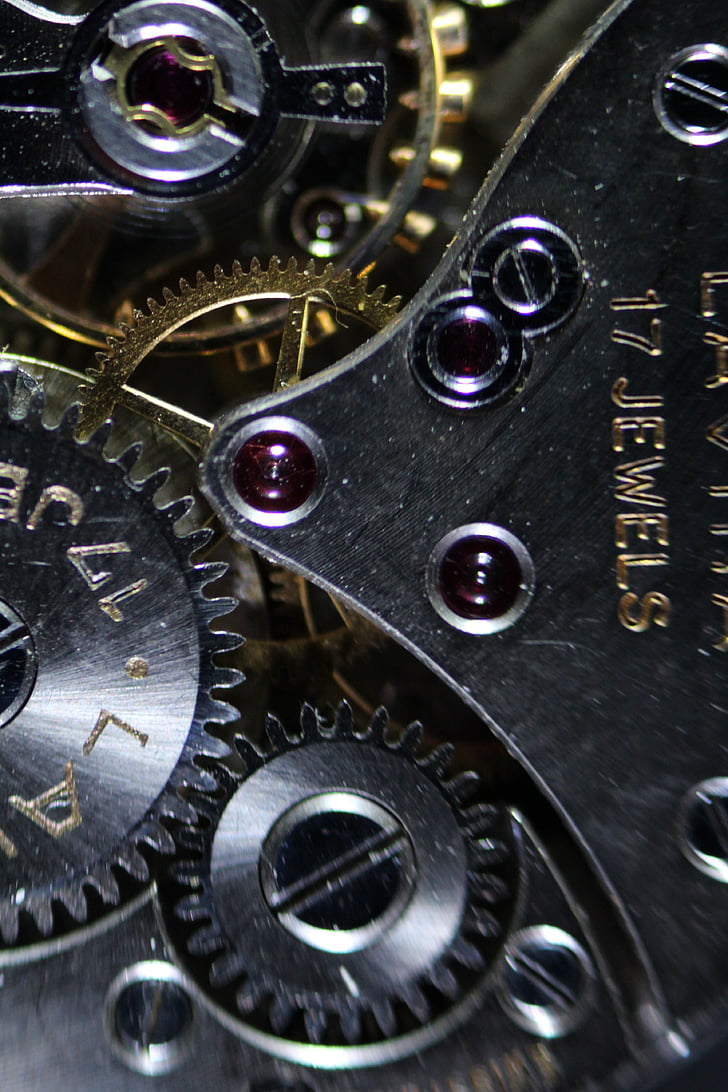 closeup photography of silver gears