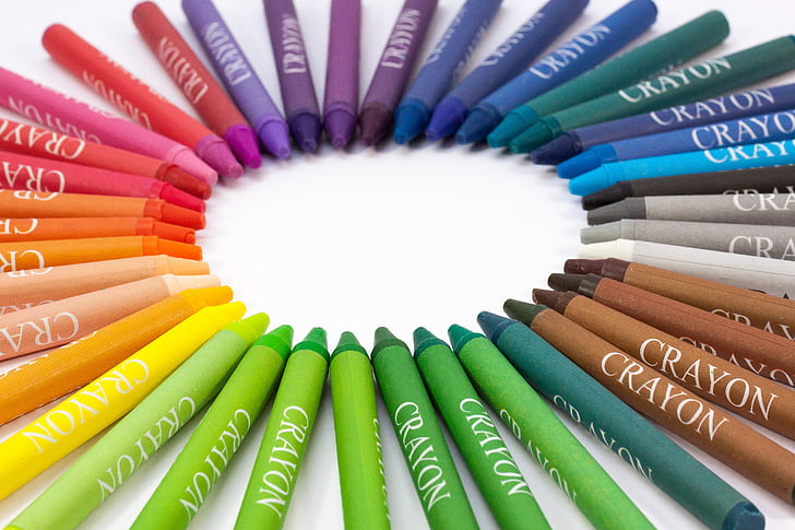 assorted-color crayon lot on white surface