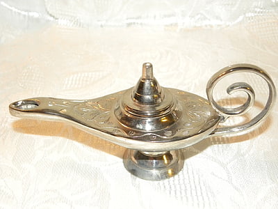 silver-colored teapot