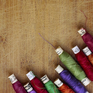 closeup photo of assorted-color threads