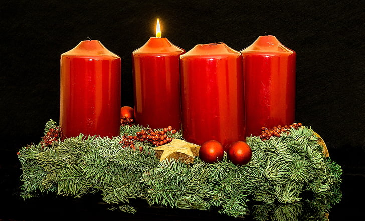 four red candle figurine