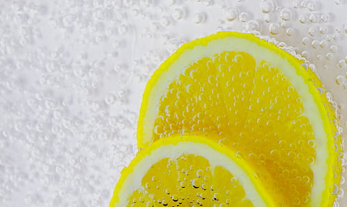 selective focus photography of lemon lime