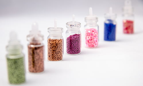 assorted-color glitter bottles
