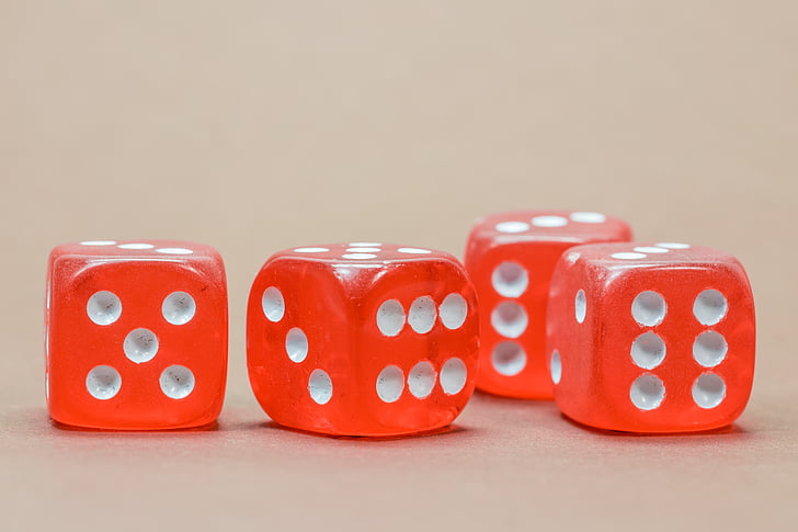 four red-and-white dices
