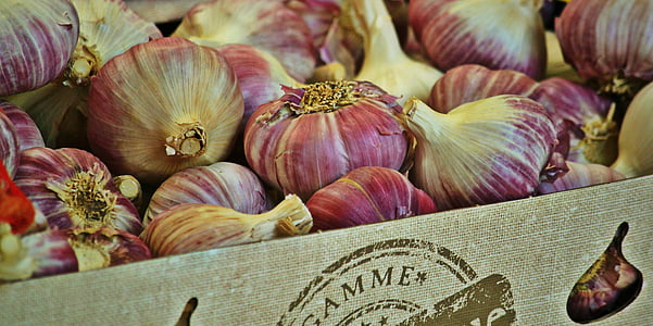 red onions on crate