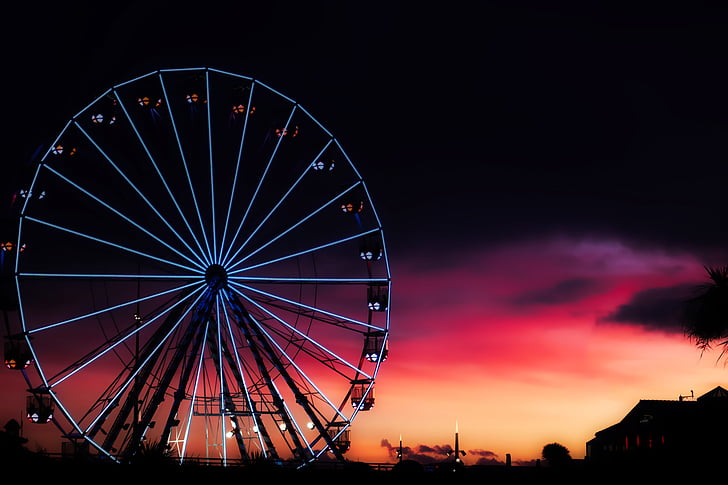gray and black Ferris wheel during sunset