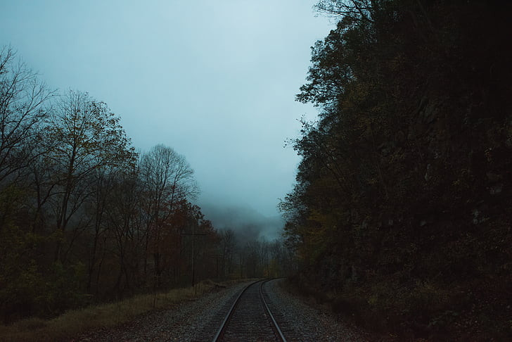 railway under the cloudy sky