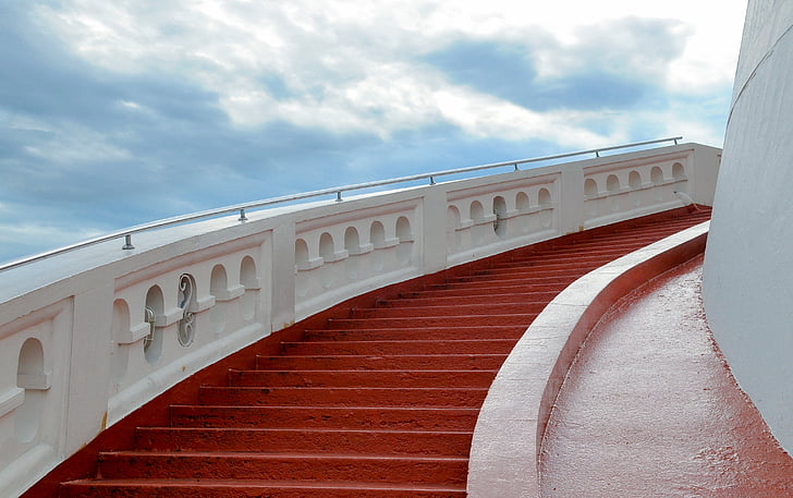 photography of white and red concrete steps