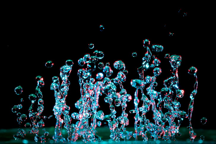 focus photo of blue and pink bubbles