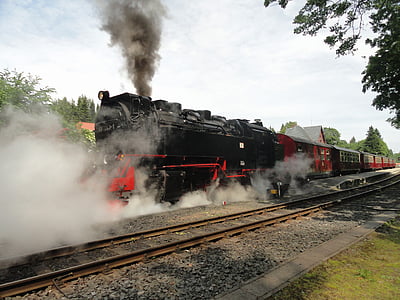 black and red steam train