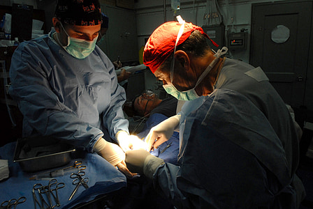 person doing surgery operation