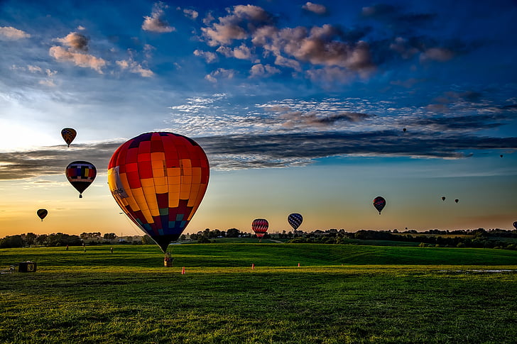 hot air balloon lot during sunset