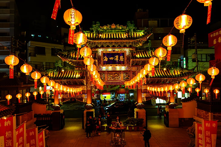 brown temple with chinese lanterns