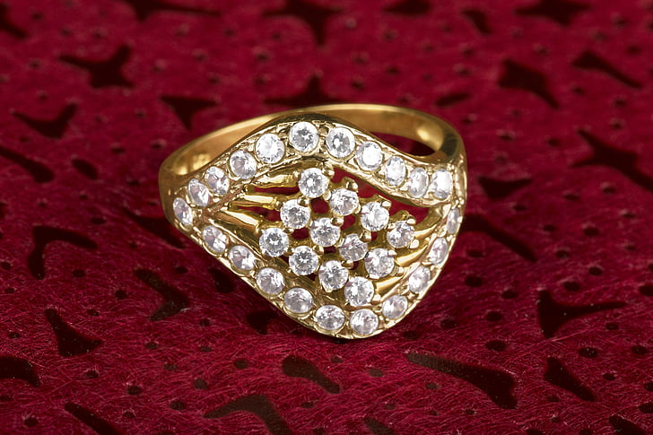 jeweled gold-colored ring