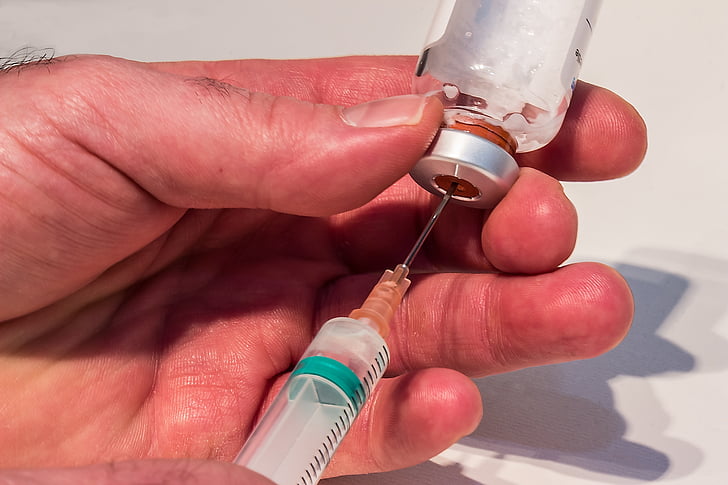 clear syringe and bottle