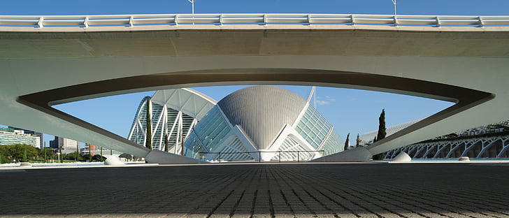 architectural photography of gray dome under bridge